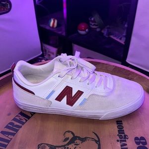 slightly worn new balance shoes